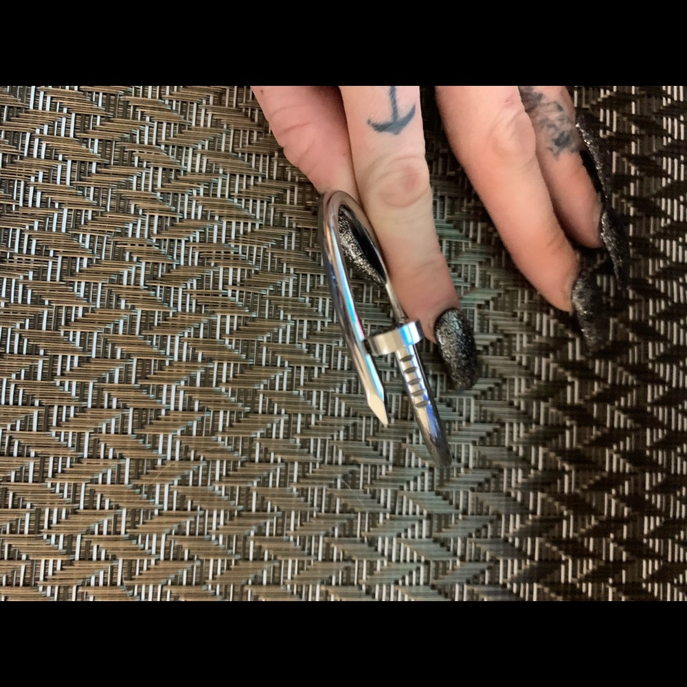 Stainless sleek nail bracelet